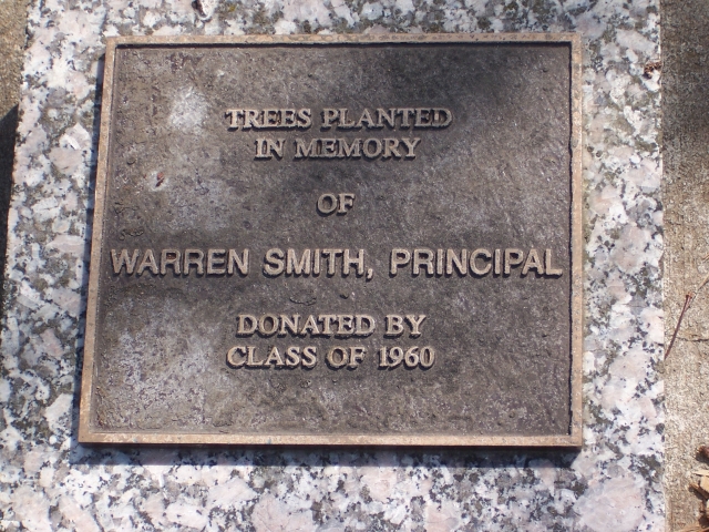 Located by the tree on the East side of entrance to Park High.