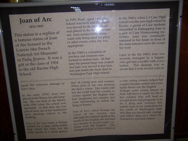History of Joan of Arc on front of pedestal.